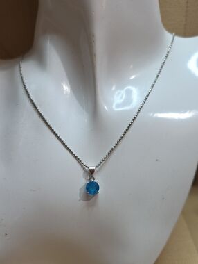 London blue topaz Pendant  set in Sterling silver 925 on a  925 16 Inch  chain.